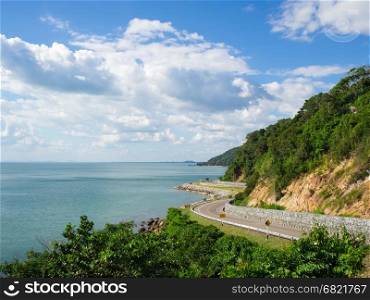 Sea side road near the mountain in the eastern sea coast of chanthaburi thailand