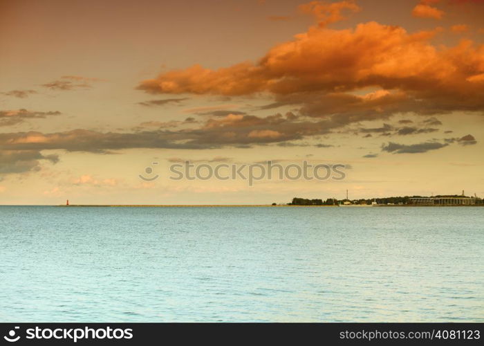 Sea sky and lighthouse at sunset or sunrise. Baltic sea. Poland Danzig Gdansk.