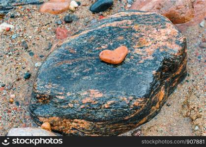 sea stone red on black, stone heart. stone heart, sea stone red on black