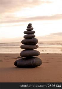 Sea stones stacked on the beach