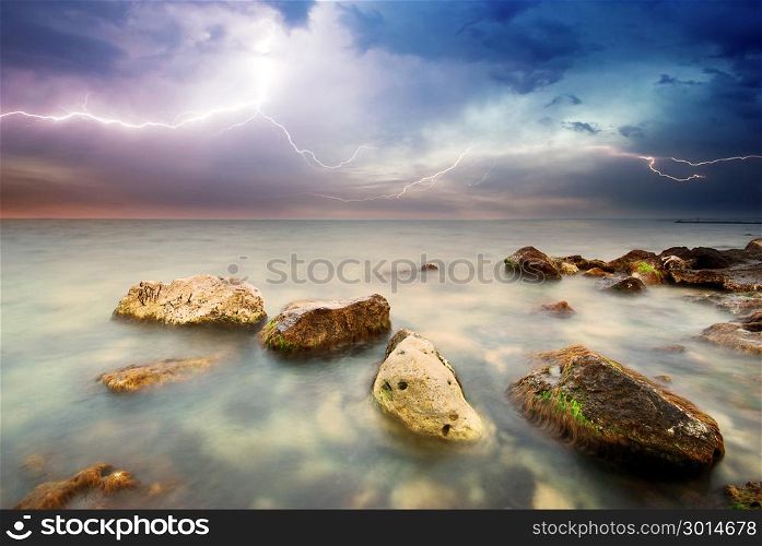 Sea storm lightning. Seascape power of nature.