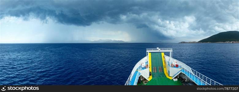 Sea summer view with stormy sky from train ferry on way from Kefalonia to Ithaca (Greece). Panorama.