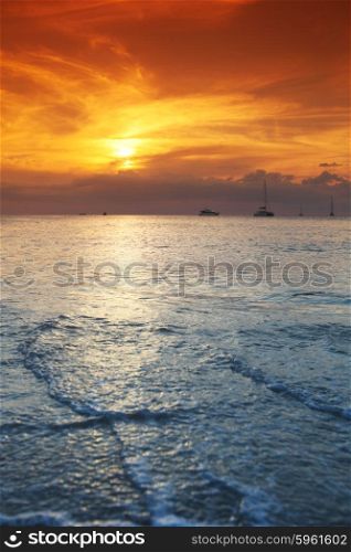 Sea sunset. Beautiful sunset with orange sky over blue sea