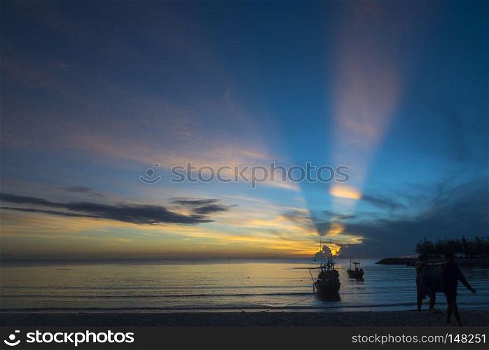 sea sunset with fishing boat
