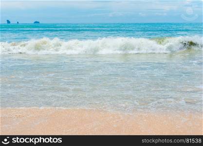 sea surf, beautiful beach with gentle sand, Krabi resort, Thailand