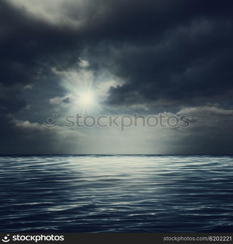 Sea surface under stormy skies, abstract natural backgrounds