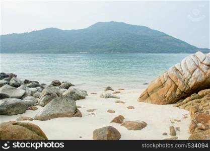 Sea tropical landscape with mountains and rocks, blue sea and blue sky. Sea tropical landscape with mountains and rocks