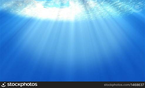 Sea Underwater light beautiful veil of sunlight. ocean waves underwater movement and flow with the rays.Beam shining from deep clear blue water causing a beautiful water lighting reflections.