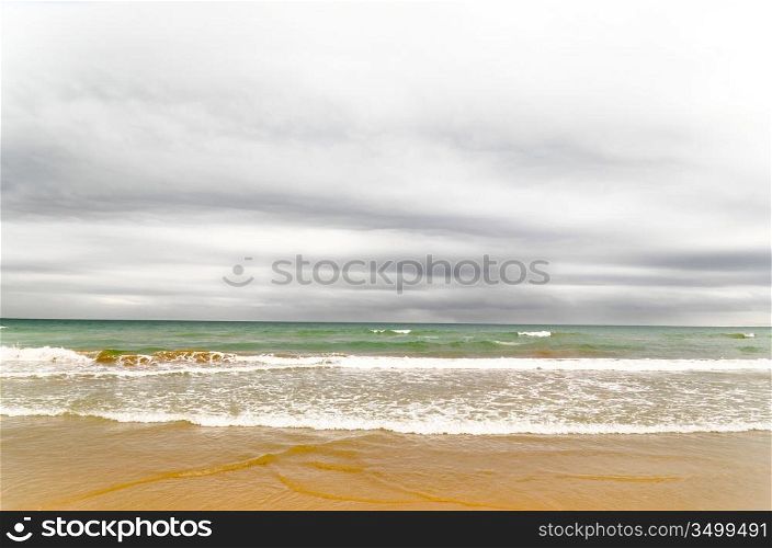 sea view on beach at cloudy day