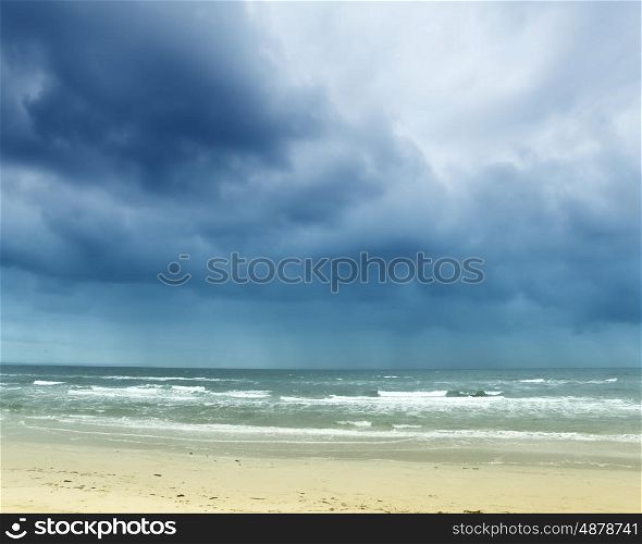 Sea view. Sea shore view image with clouds above