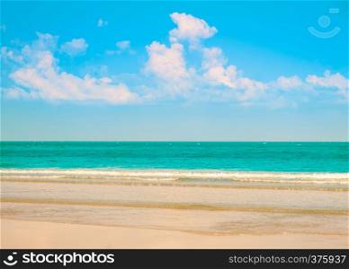 Sea view with tropical beach and blue sky in summer day. Tone filtered color image