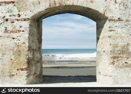 Sea viewed from an archway