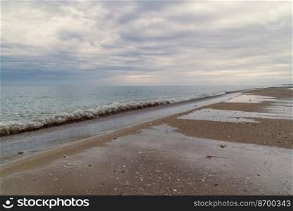 Sea wavelet landscape photo. Beautiful nature scenery photography with seacoast view on background. Idyllic scene. High quality picture for wallpaper, travel blog, magazine, article. Sea wavelet landscape photo