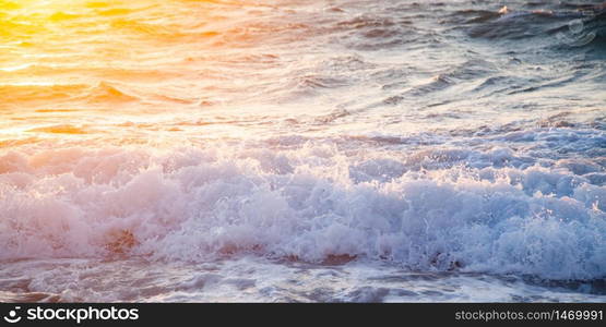 sea waves at sunset summer holiday background