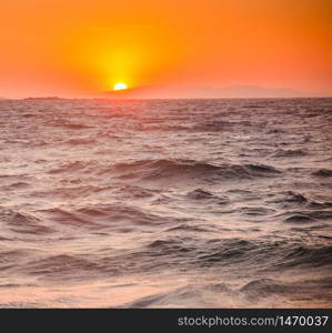 sea waves at sunset summer holiday background