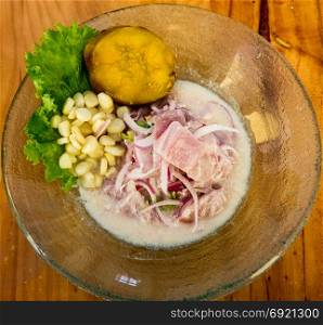 Seafood ceviche raw on background. Traditional dish of Peru or Chile