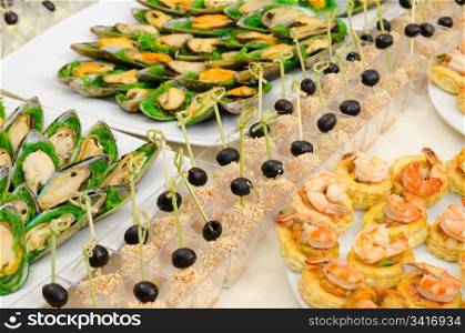 seafood cold snacks on buffet table, catering