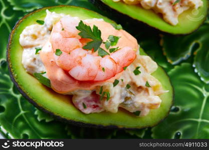 Seafood filled avocado with shrimps tapas pinchos from Spain food recipes