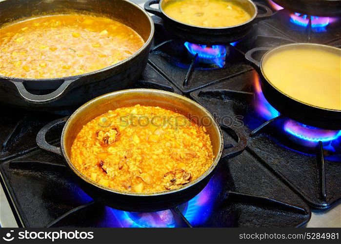 Seafood paella cooking process with cuttlefish squid