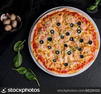 Seafood pizza with shrimps top view