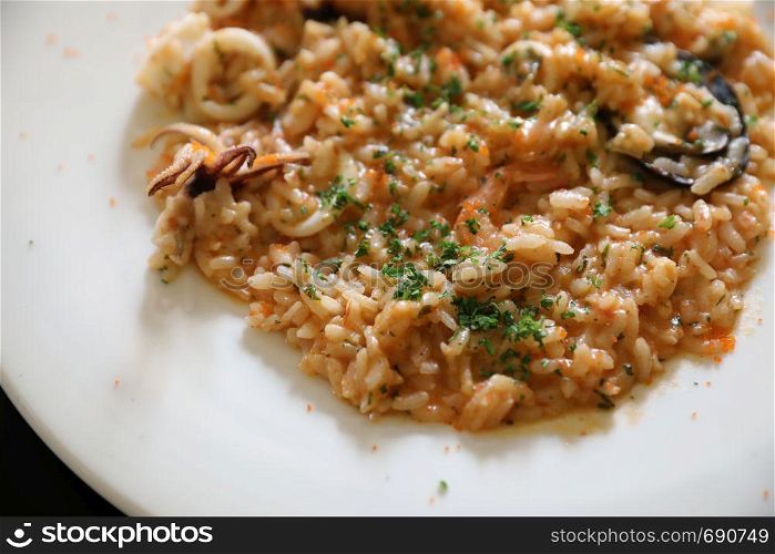 Seafood Risotto , traditional italian rice on table
