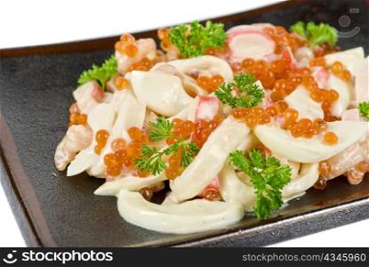 Seafood salad ar plated isolated on a white background