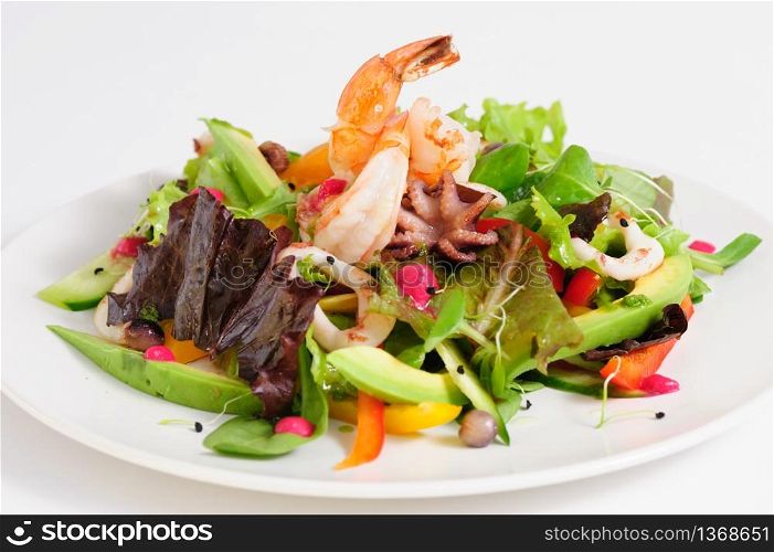 Seafood salad with fresh vegetables and herbs. Seafood salad with fresh vegetables