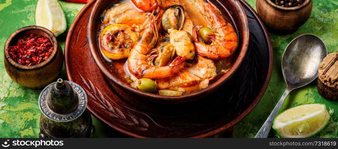 Seafood soup with prawns, mussels and fish.Delicatessen food. Fresh seafood soup