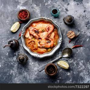 Seafood soup with prawns, mussels and fish.. Soup with prawns