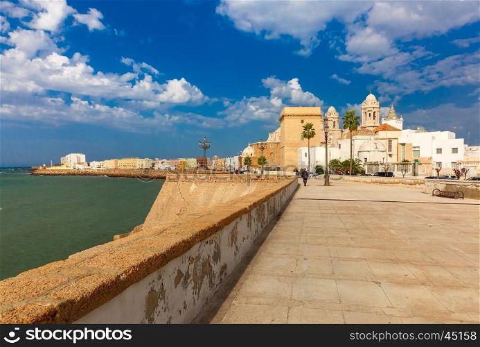 Seafront and Cathedral de Santa Cruz in the morning in Cadiz, Andalusia, Spain