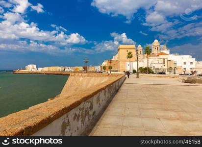 Seafront and Cathedral de Santa Cruz in the morning in Cadiz, Andalusia, Spain