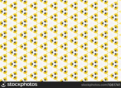 Seamless geometric pattern. In yellow, black and white colors.