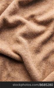 Seamless texture of handmade knitting of natural yarn. Knitted background. 
