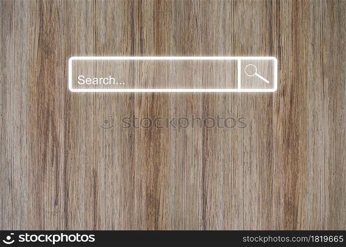 Search bar online browsing on wood table. Idea for searching browse data information networking