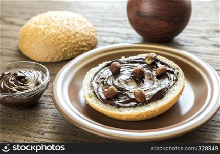 Seasame bun with chocolate cream and nuts