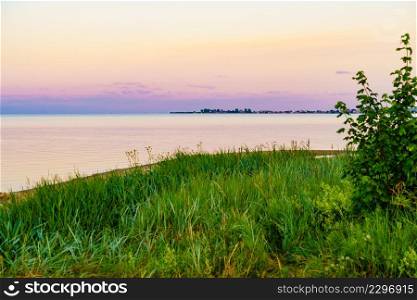 Seascape at evening. Baltic Sea, Puck Bay with Rewa village on horizin, Poland. Nature landscape.. Seascape at evening. Baltic Sea, Poland