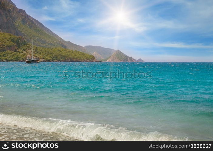 seascape, blue sky and mountainous coast