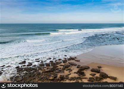 Seascape Ericeira Portugal. Classic glassy morning waves, perfect for surfing.
