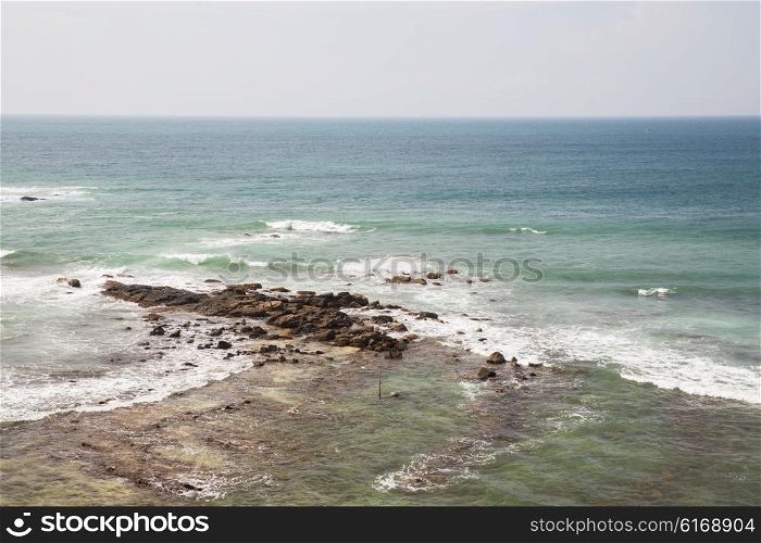 seascape, nature, travel and water concept - sea and sky on Sri Lanka