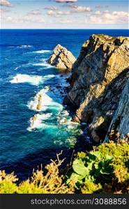 Seascape of Atlantic ocean and Asturias rocky coast at Cape Penas. Sea shore with high cliffs in north Spain.. Coast at the Cabo de Penas in Asturias, Spain