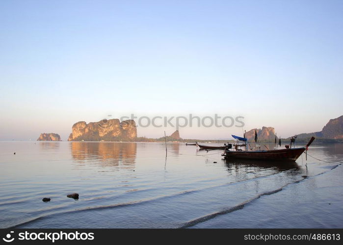 seascape photo of fishing boat in the sea with beautiful sky background