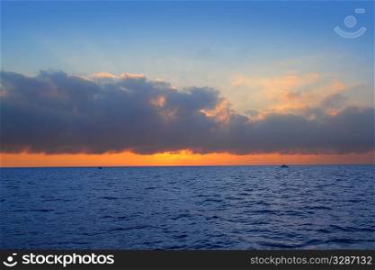 seascape sunrise first sun orange in blue sea ocean
