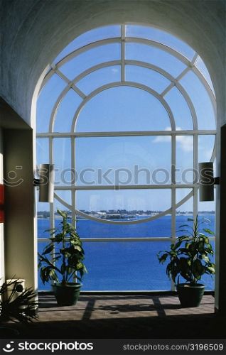 Seascape through a glass window, Castle harbor hotel, Bermuda