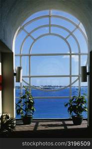 Seascape through a glass window, Castle harbor hotel, Bermuda