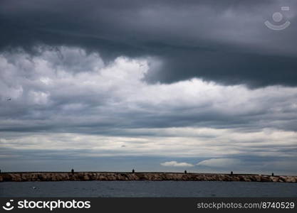 seascape with dark clouds and light