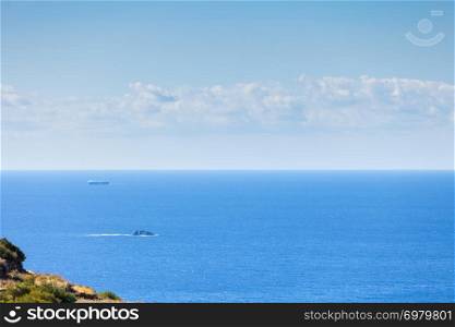 Seascape with ship on calm water surface.. Seascape with ship on water surface