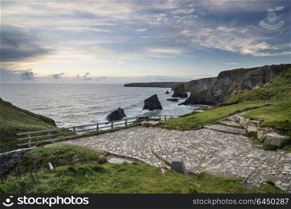 Seascapes. Landscape of Bedruthan Steps, famous rock stacks at sunset in Cornwall England