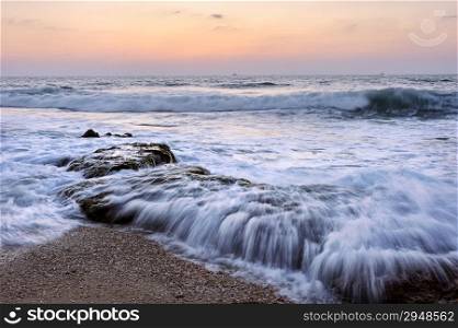 Seashore after sunset Shore of the Mediterranean Sea late in the evening after sunset