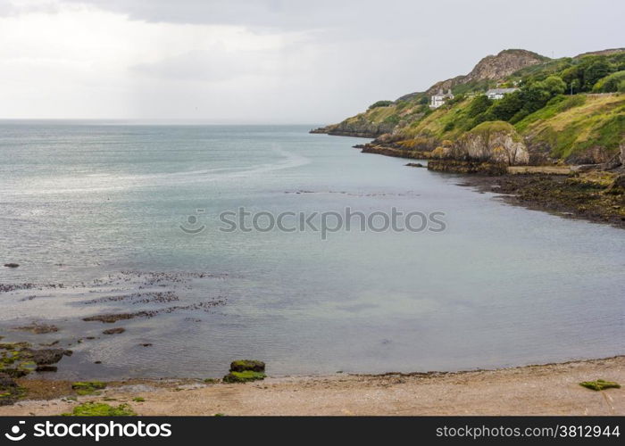 Seaside landscape with storm at background in Howth