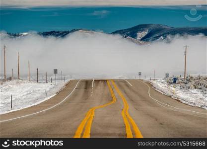 Season changing, first snow along highway in Colorado, USA.